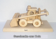 Landwirtschaftliche Lader Spielzeug an der Basis des Geschenks