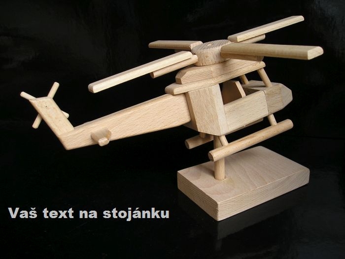 Der Holz-Hubschrauber auf Sockel ist ein elegantes Modell aus hochwertigem Holz, das Spielzeug und Dekoration vereint. Mit drehbaren Rotoren und der Möglichkeit zur Personalisierung eignet er sich ideal als Geburtstagsgeschenk für Kinder, Piloten und Luftfahrtbegeisterte.