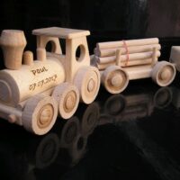Holzlokomotive mit Kohlewagen Eisenbahn