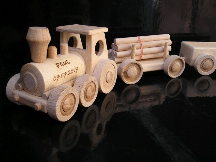 Holzlokomotive mit Kohlewagen Eisenbahn